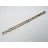 A curb chain bracelet stamped 925, 23 cm (l), approximately 63 grams all in.