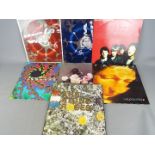 A collection of 12" vinyl records comprising The Stone Roses (ORELP502),
