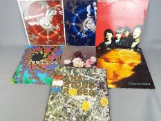 A collection of 12" vinyl records comprising The Stone Roses (ORELP502),