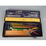 A metal cased technical drawing set by A.G.