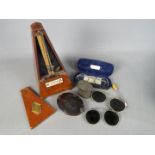 Lot to include a Maelzel Metronome, folding magnifying glass and other.