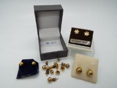 9ct gold - a pair of 9ct gold earrings with butterfly backs and a quantity on yellow metal earrings