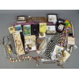 Costume Jewellery - a quantity of vintage costume jewellery to include brooches, necklaces,