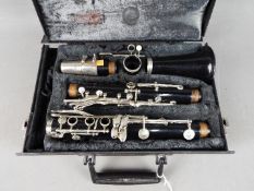 A cased clarinet.