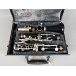 A cased clarinet.