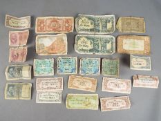 A collection of foreign banknotes to include WWII period Japanese Government notes in Rupee and