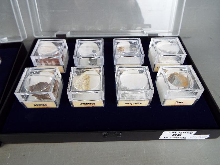 Four display cases, each containing eight boxed mineral samples with labels of origin. - Image 5 of 5