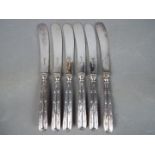A set of six George V hallmarked silver butter knives,