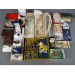 Costume Jewellery - a mixed lot of costume jewellery to include brooches, necklaces,