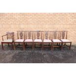 A set of six George III style mahogany dining chairs each with serpentine eared top rail,