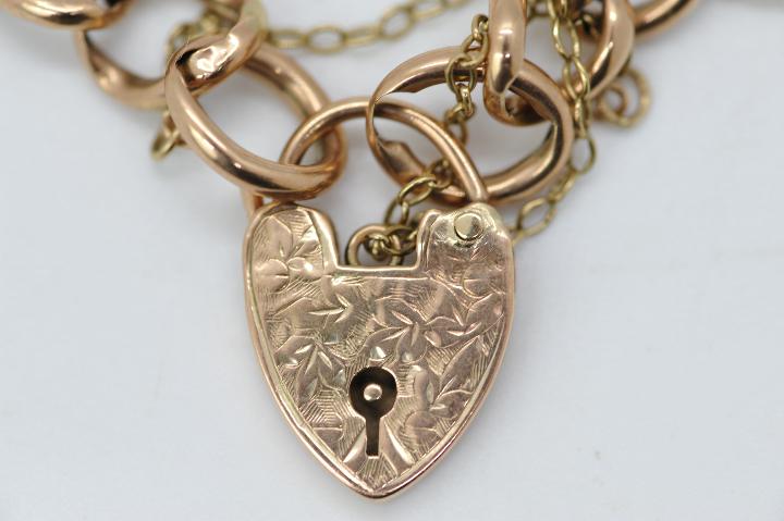 A 9ct rose gold bracelet with padlock clasp and safety chain, stamped 9c, 20 cm (l), - Image 2 of 3