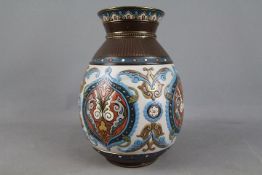 Villeroy & Boch - An early 20th century vase with scrolling relief decoration,