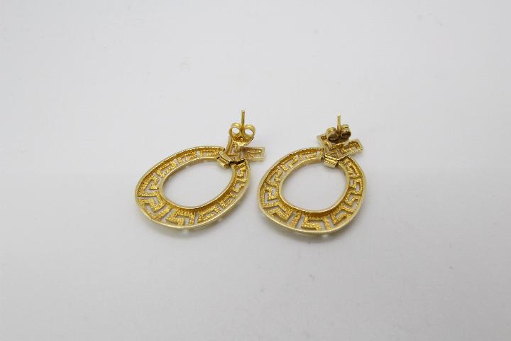 A pair of yellow metal earrings presumed gold (unmarked) with one of the butterfly clasps stamped - Image 2 of 2