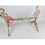 A Victorian brass Fire Dogs stand, 33 cm x 52.