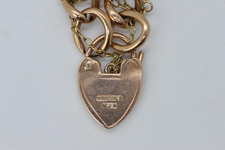 A 9ct rose gold bracelet with padlock clasp and safety chain, stamped 9c, 20 cm (l), - Image 3 of 3