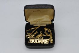 9 ct Gold - a 9ct gold necklace displaying the name Yvonne, stamped 375, approximate weight 5.