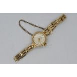 A lady's 9ct gold cased, Griffon, 21 jewel wristwatch on 9ct gold bracelet,
