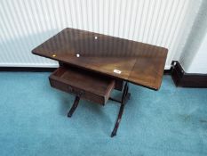 A small mahogany drop-leaf table with single drawer,