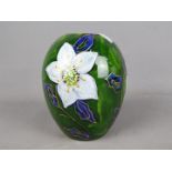 Anita Harris - a vase of ovoid form hand painted with white flowers on a green ground with gilded