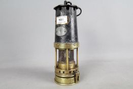 A miner's safety lamp marked Nayler of Wigan - Est £20 - £40