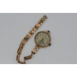 9 ct Gold - a 9ct gold wrist watch with a 9ct gold expandable bracelet (a/f) approximate weight 24.