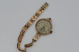 9 ct Gold - a 9ct gold wrist watch with a 9ct gold expandable bracelet (a/f) approximate weight 24.