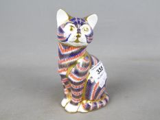 Royal Crown Derby - a paperweight in the style of a seated cat,