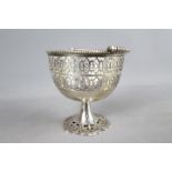 A silver pedestal bowl with pierced decoration and swing handle, Mappin, standing 11.
