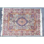 A good quality silk carpet measuring approximately 124 cm x 174 cm.
