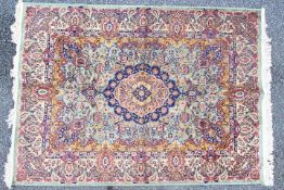 A good quality silk carpet measuring approximately 124 cm x 174 cm.