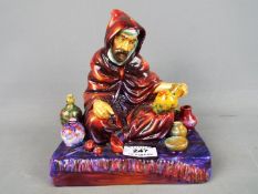 Royal Doulton - a figurine entitled 'The Potter' HN 1493, signed to the base by Michael Doulton,