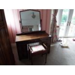 An oak knee-hole dressing table with swing mirror and stool,