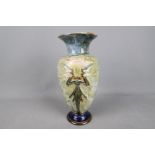 Eliza Simmance for Royal Doulton, a stoneware Art Nouveau vase of baluster form with flared rim,