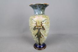 Eliza Simmance for Royal Doulton, a stoneware Art Nouveau vase of baluster form with flared rim,