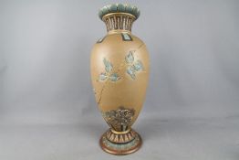 A large Doulton Lambeth Silicon Ware vase of baluster form, incised floral decoration,