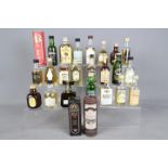 Twenty five whisky miniatures, predominantly Scotch to include Jura, Dalwhinnie, Glenkeith,