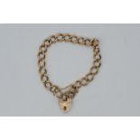 A 9ct rose gold bracelet with padlock clasp and safety chain, stamped 9c, 20 cm (l),