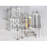 Eleven pairs of knife rests including glass examples, white metal and plated.
