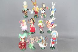 A set of twelve Hamilton Collection 'Alice In Wonderland' hand painted pewter figurines,