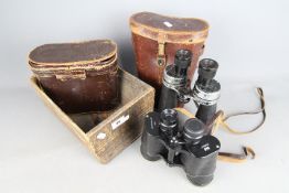 A pair of Barr & Stroud Glasgow & London 7x CF15 binoculars in leather case and a further pair of