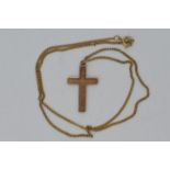 9 ct Gold - a 9 ct gold crucifix,