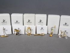 Swarovski Crystal - six Swarovski Crystal collectables to include binoculars, lamp, tricycle,