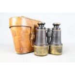 A pair of early 20th century binoculars Ross, London, stamped with Broad Arrow / crows foot,