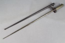 A WW1 French 1886/93/16 Epee Lebel Bayonet and scabbard for the Lebel Rifle.