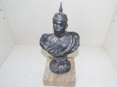 World War One (WW1) - an early white metal sculpture depicting an officer in dress uniform with