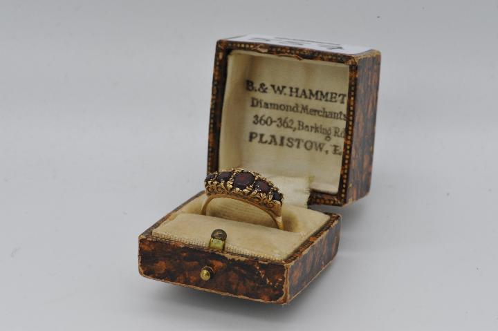 9ct gold - a hallmarked 9ct gold ring, set with five graduated stones, size U, approximate weight 4.