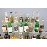 Twenty five whisky / whiskey miniatures, predominantly Scotch, to include Tomatin, Glenlossie,