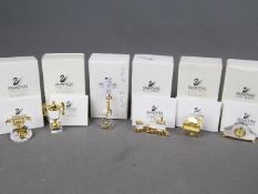 Swarovski Crystal - six Swarovski Crystal collectables to include a vintage telephone, grand piano,