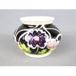 Moorcroft Pottery - a globular vase decorated in the Penny Black pattern, TRIAL piece, approx 9.