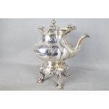 A Victorian electroplated spirit kettle, with ivory swing handle and hinged cover with finial,